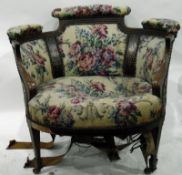 Edwardian marquetry inlaid mahogany and upholstered tub chair raised on square tapering supports,