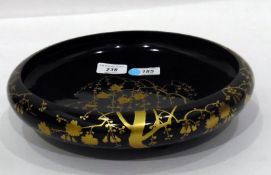 Early 20th century Japanese lacquer bowl of circular form, decorated with gilt prunus blossom,