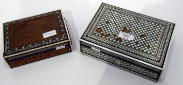 Middle Eastern inlaid rectangular box and another with wooden carved panel,