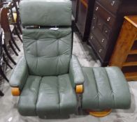 Modern green leather upholstered swivel recliner chair on stained beech frame and a footstool