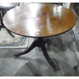 Circular mahogany tilt-top breakfast table of Regency design,