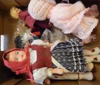 Pair of German dolls in traditional dress and three other modern dolls (1 box)