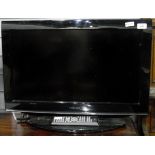 Toshiba 26" flatscreen television/DVD player with remote control