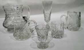Two glass decanters, various glass jugs, four tumblers,