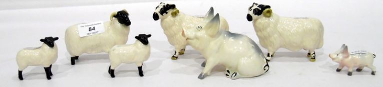 Pair of Beswick sheep, another sheep,