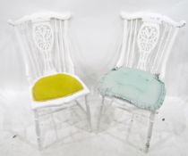 Pair of white painted kitchen/conservatory chairs with fret carved and pierced splat and turned