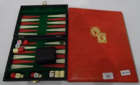 Folder and contents of all world stamps and a travelling backgammon set (2)