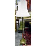 Brass lamp standard in the classical form, having reeded column with brass caps,