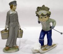 Lladro porcelain figure of Dutch boy carrying pair of pails and a Lladro porcelain figure of