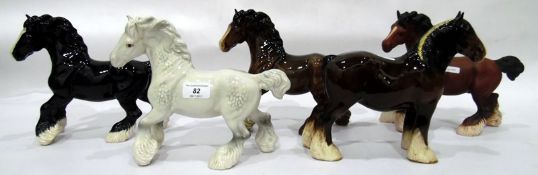 Five Beswick model shire horses, three brown, one black and one dappled grey,