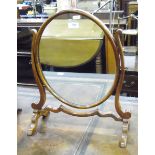 Georgian-style mahogany swing-frame oval dressing table mirror on splayed legs,