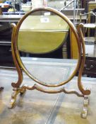 Georgian-style mahogany swing-frame oval dressing table mirror on splayed legs,