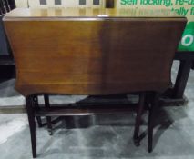 Edwardian mahogany Sutherland table with butterfly wing shaped top, on square tapering supports,