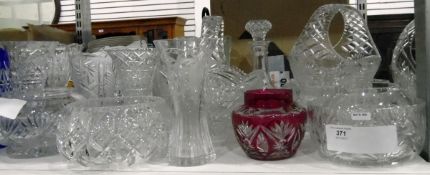 Large quantity of cut glass including bowls, vases, two flash glass items, a decanter,