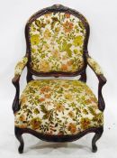 Victorian mahogany-framed open arm elbow chair having floral upholstered pad back, seat and arms,