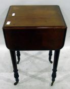 19th century mahogany fall-flap work table fitted a drawer to frieze and on turned supports with