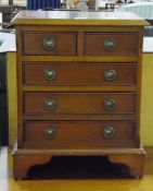 Contemporary yew wood veneer miniature chest of two short and three long graduated drawers,