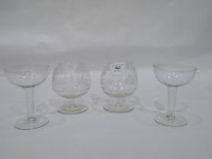Set of brandy glasses with etched hunting scenes and six champagnes