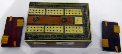 Middle Eastern inlaid travelling cribbage board and a pair of games markers (3)