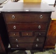 Stag Furniture chest of drawers with three short and four long drawers, on bracket feet,