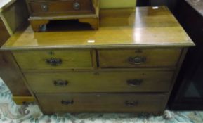 Edwardian walnut chest of drawers with two short and two long graduated drawers, on bracket feet,