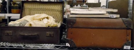 Vintage leather suitcase, another vintage leather case, a 1920's chiffon and lace evening dress,