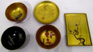 Set of Oriental lacquered bowls and dishes decorated with storks