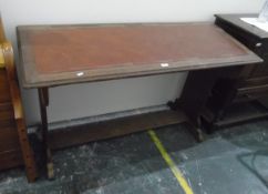 Early 20th century sloping writing table with pen trough and filled in well space,