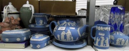 Quantity of Wedgwood blue jasperware including teapot, sugar bowl, jug, cups and saucers,