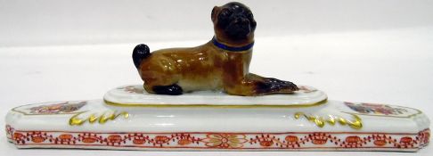 Model pug paperweight with blue cross-swords mark to base, 6cm high x 18.