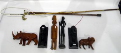 Various wooden carved African objects to include buffalo, elephants,