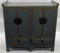 Oriental grey painted dwarf cabinet enclosed by four cupboard doors over two short drawers,