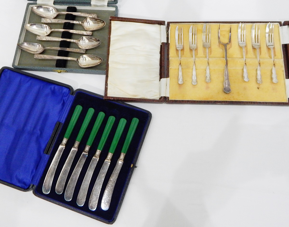 Quantity of cased plated flatware to include coffee spoons,