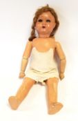 Bisque headed doll with composition body, open eyes and mouth, unmarked back of head,