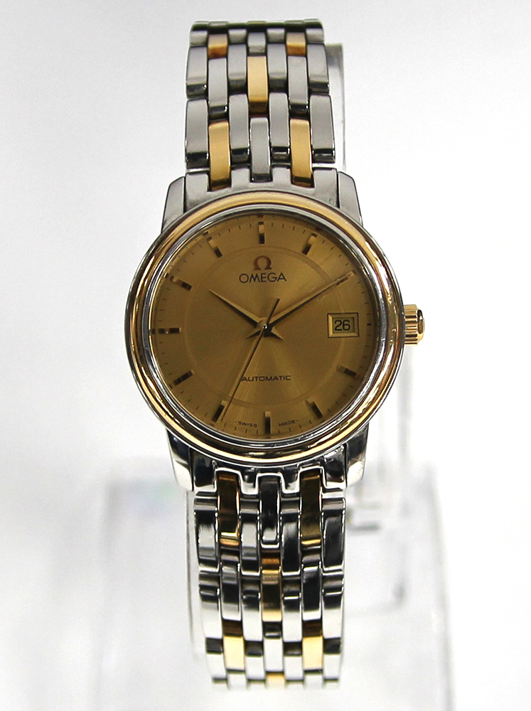 Omega lady's wristwatch in yellow gold/steel case, champagne dial,