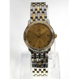 Omega lady's wristwatch in yellow gold/steel case, champagne dial,