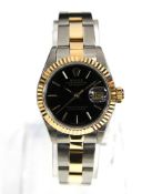 Rolex Datejust lady's wristwatch 69173 in yellow/gold steel case, black dial,