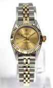 Rolex Oyster Perpetual lady's wristwatch 67193 in yellow gold/steel case, champagne baton dial,