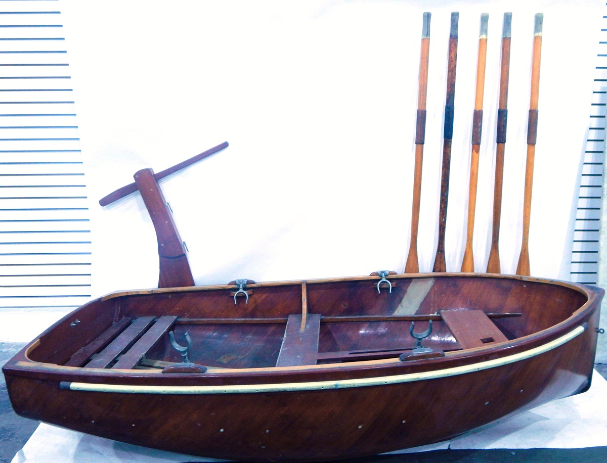 Wooden hand-built four-oar dinghy/cat boat with five wooden oars, four metal rowlocks,