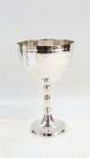 A large silver plate goblet shaped trophy 23.