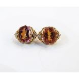 Pair of gold iridescent stone and diamond earrings