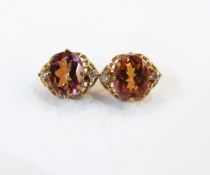 Pair of gold iridescent stone and diamond earrings
