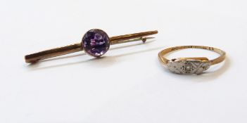 9ct. gold bar brooch set with amethyst coloured stone, 9ct. gold 'Taurus' charm and 9ct.