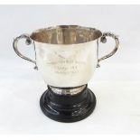 Silver two-handled trophy cup with flared rim on a raised ebonised circular foot "Coronation Race