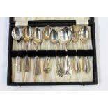 Thirteen silver coffee spoons, various,