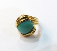 18ct gold and turquoise ring, circular turquoise cabochon entwined and mounted in gold,