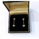 Pair of 18ct white gold, diamond and Tahitian pearl drop earrings, the pearls 8cm in diameter,