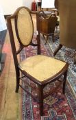 Edwardian inlaid mahogany and cane chair