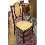 Edwardian inlaid mahogany and cane chair