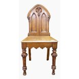 Oak hall chair with arched shaped back,